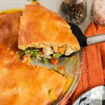 a scoop coming out of a turkey pot pie